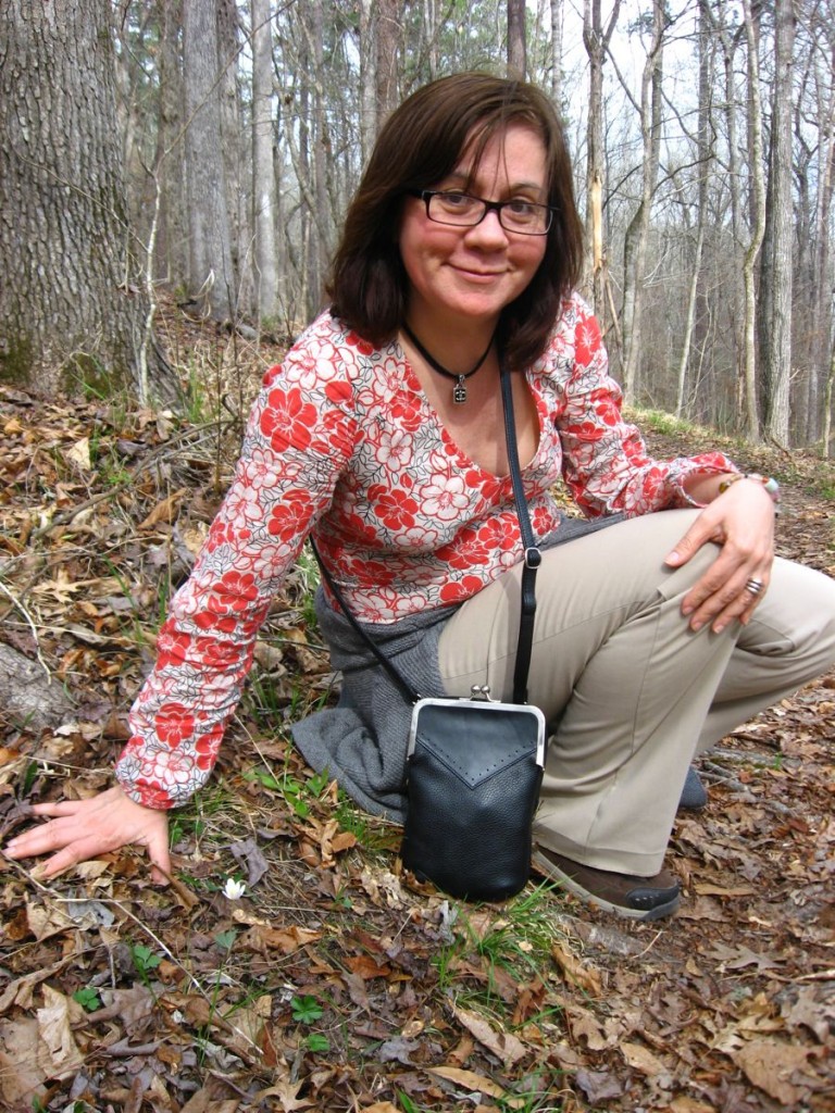 Isabelle Dijols overjoyed to see a bloodroot flower for the first time in 2011 - Sumter National Forest, South Carolina